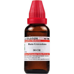 A brown glass bottle containing a homeopathic dilution labeled "Ruta Graveolens 30 CH," with a red screw cap and clear dosage information.