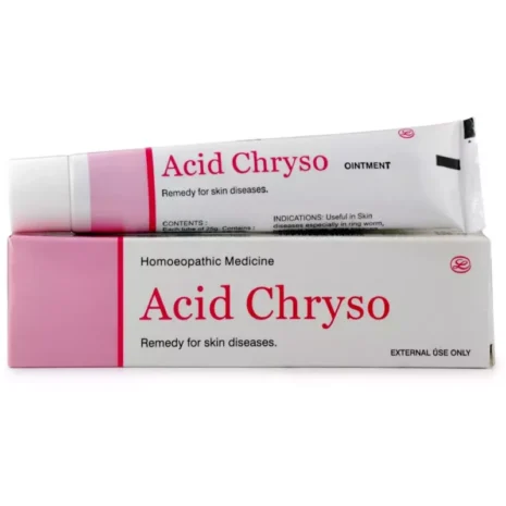 A tube of Acid Chryso ointment and its box, labeled as a homeopathic remedy for skin diseases.