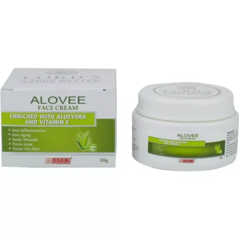 Aloe vera and vitamin E enriched face cream in a white jar beside its packaging, highlighting benefits like anti-aging and hydration.