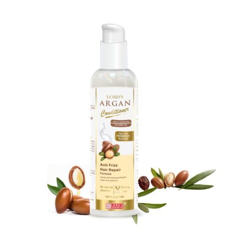 A bottle of LORD'S Argan Conditioner featuring ingredients like keratin and jojoba oil, surrounded by argan nuts and leaves.