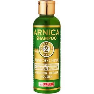 A green bottle of Arnica Shampoo featuring labels that emphasize its damage repair and nourishing properties.