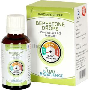 A bottle of Bepeetone Drops alongside its packaging, labeled as a homeopathic medicine that helps manage low blood pressure.