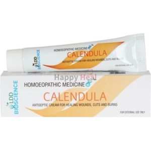 A tube of Calendula antiseptic cream placed on its box, labeled as homoeopathic medicine for healing wounds, cuts, and burns.