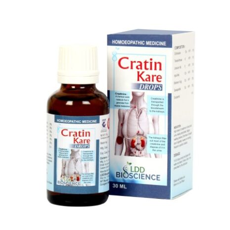 A bottle of Cratin Kare homeopathic medicine, featuring a label with an illustration of the human body, next to its packaging showing nutritional information and brand details.