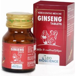 A brown bottle of Ginseng tablets next to a red and white box labeled 'Homoeopathic Medicine' and featuring health-related graphics.