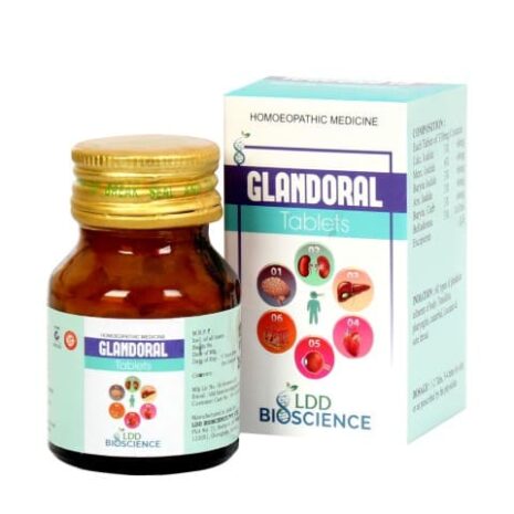 A bottle of Glandoral tablets alongside its packaging, depicting homeopathic medicine for various health conditions.