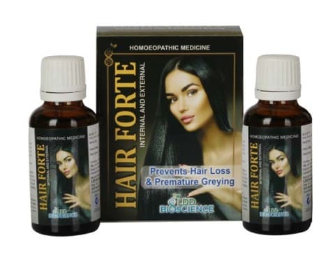 Two bottles of Hair Forte with packaging, promoting prevention of hair loss and premature greying.