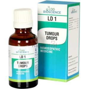 A bottle of LDD Bioscience Tumour Drops homoeopathic medicine alongside its packaging.