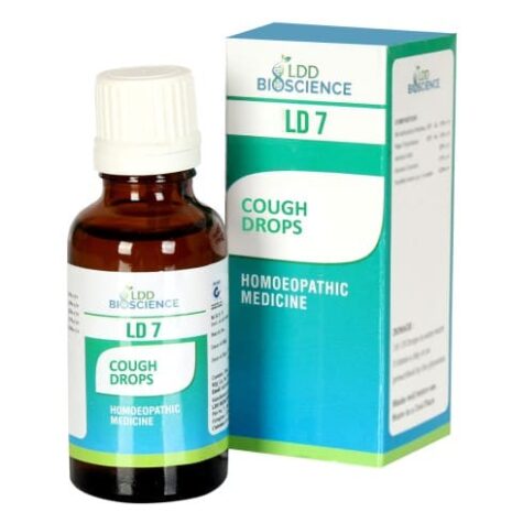 A brown glass bottle of LD 7 cough drops alongside its blue and green packaging, labeled as a homeopathic medicine.