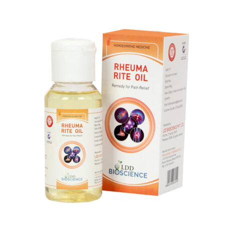 A bottle of Rheuma Rite Oil with accompanying packaging, labeled as a homeopathic remedy for pain relief, from LDD Bioscience.