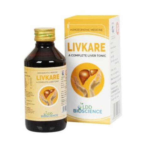 Bottle of LIVKARE with packaging, promoting liver health and wellness.