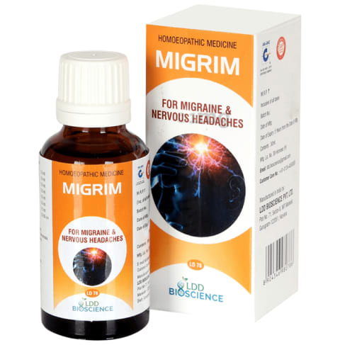 Bottle of MIGRIM homoeopathic medicine for migraine and nervous headaches, alongside its packaging.