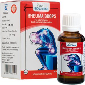 A bottle of Rheuma Drops with a label indicating it is a homeopathic medicine for relief in joints, back pain, and inflammation, accompanied by its packaging box.