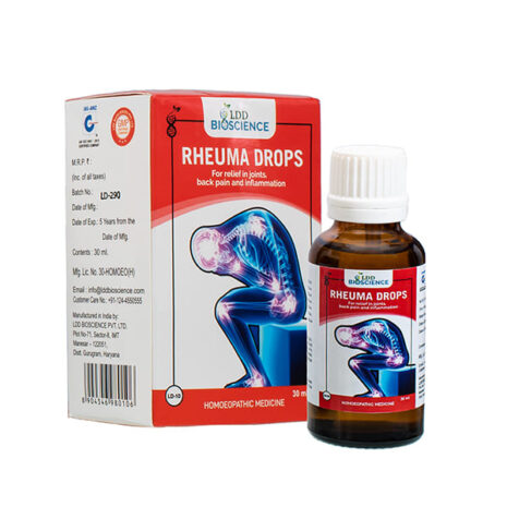 A bottle of Rheuma Drops with a label indicating it is a homeopathic medicine for relief in joints, back pain, and inflammation, accompanied by its packaging box.