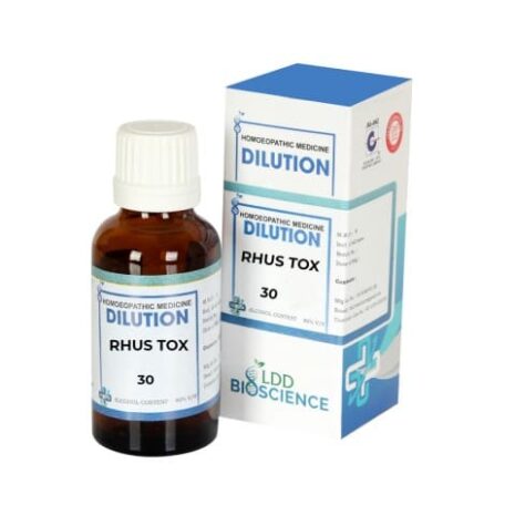 A brown glass bottle of Rhus Tox 30 dilution homeopathic medicine, with a white cap, beside its blue and white labeled box.