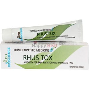 A tube of Rhus Tox homeopathic medicine for skin irritation and rheumatic pain, placed beside its packaging.