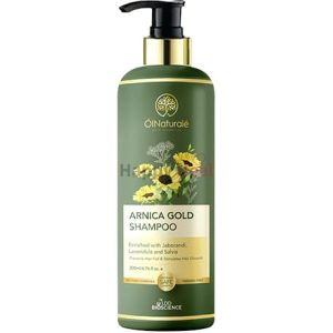 A green bottle of Arnica Gold Shampoo featuring sunflower graphics, designed to prevent hair fall and promote scalp health.