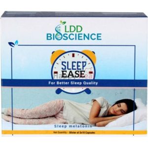 Box of "Sleep Ease" capsules promoting better sleep quality, featuring a woman peacefully sleeping on a bed.