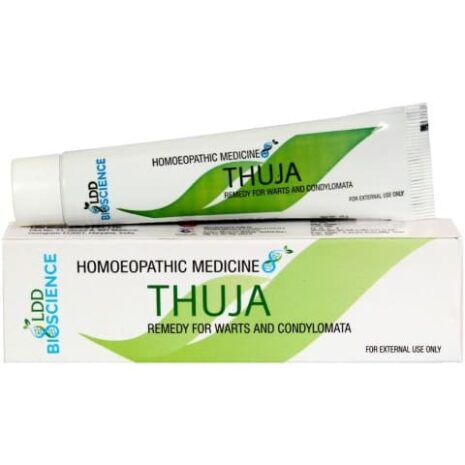 A tube of Thuja homeopathic medicine for warts, displayed with its packaging, emphasizing its natural treatment formulation.
