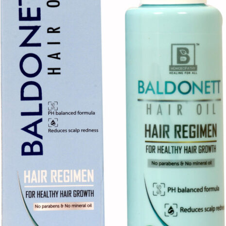 Product packaging of Baldonett Hair Oil with a focus on promoting healthy hair growth, featuring a ph balanced formula and claims of reducing scalp redness.