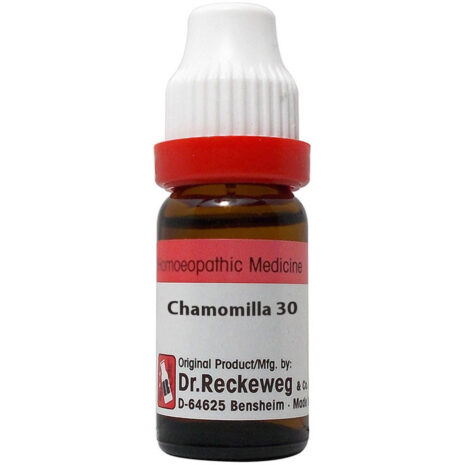 A bottle of Chamomilla 30 homeopathic medicine, featuring a brown glass design and a red cap, labeled with product details from Dr. Reckeweg.