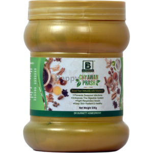 A jar of Chyawan Prash featuring health benefits like immunity enhancement and digestive support, labeled with ingredients and weight.