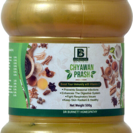 A jar of Chyawan Prash featuring health benefits like immunity enhancement and digestive support, labeled with ingredients and weight.