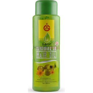 Green bottle of Sebsun Arnica Hair Oil, 1000 ml, with a label highlighting its benefits for naturally healthy and shiny hair.