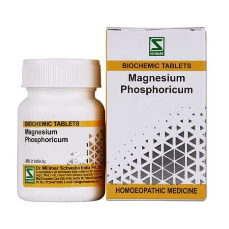 A bottle of Magnesium Phosphoricum biochemic tablets next to its packaging, which includes product information and branding details.