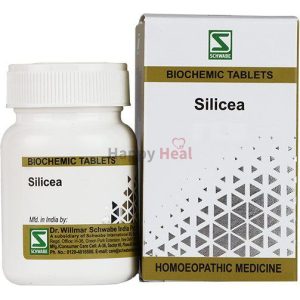 A bottle of Silicea biochemic tablets alongside its packaging, featuring a white design with geometric patterns and branding for Dr. Willmar Schwabe India.