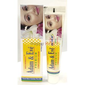 A tube of Adam & Eve Premium Complexion Cream beside its packaging, featuring a smiling woman on the box and floral accents.