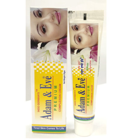 A tube of Adam & Eve Premium Complexion Cream beside its packaging, featuring a smiling woman on the box and floral accents.