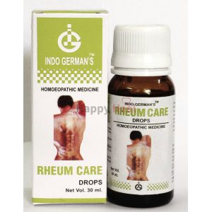 A bottle of Indo German's Rheum Care drops along with its packaging, designed for homeopathic treatment of rheumatism.